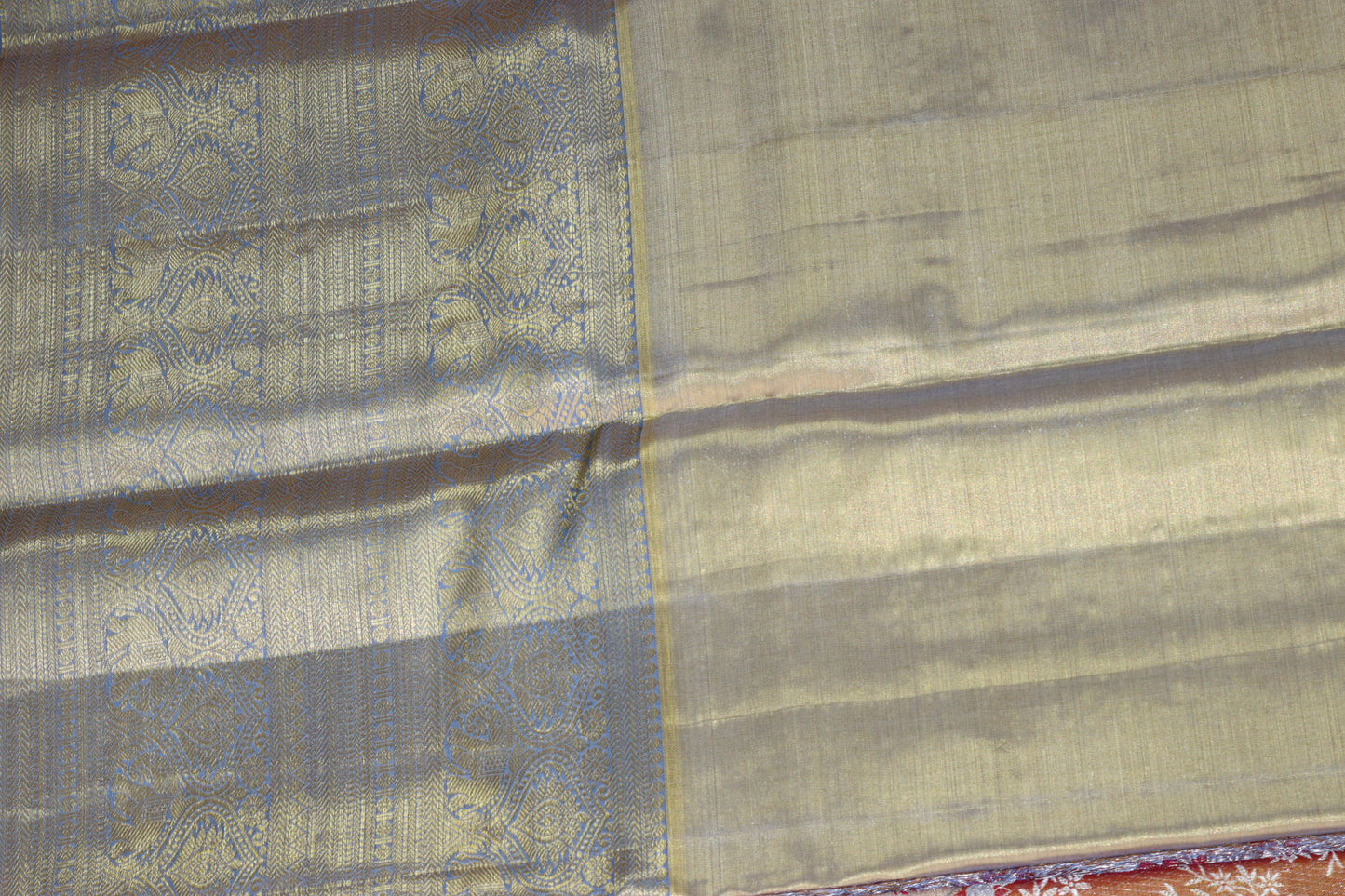 Stunning Melon Orange With Blue Kanchipuram Silk Saree