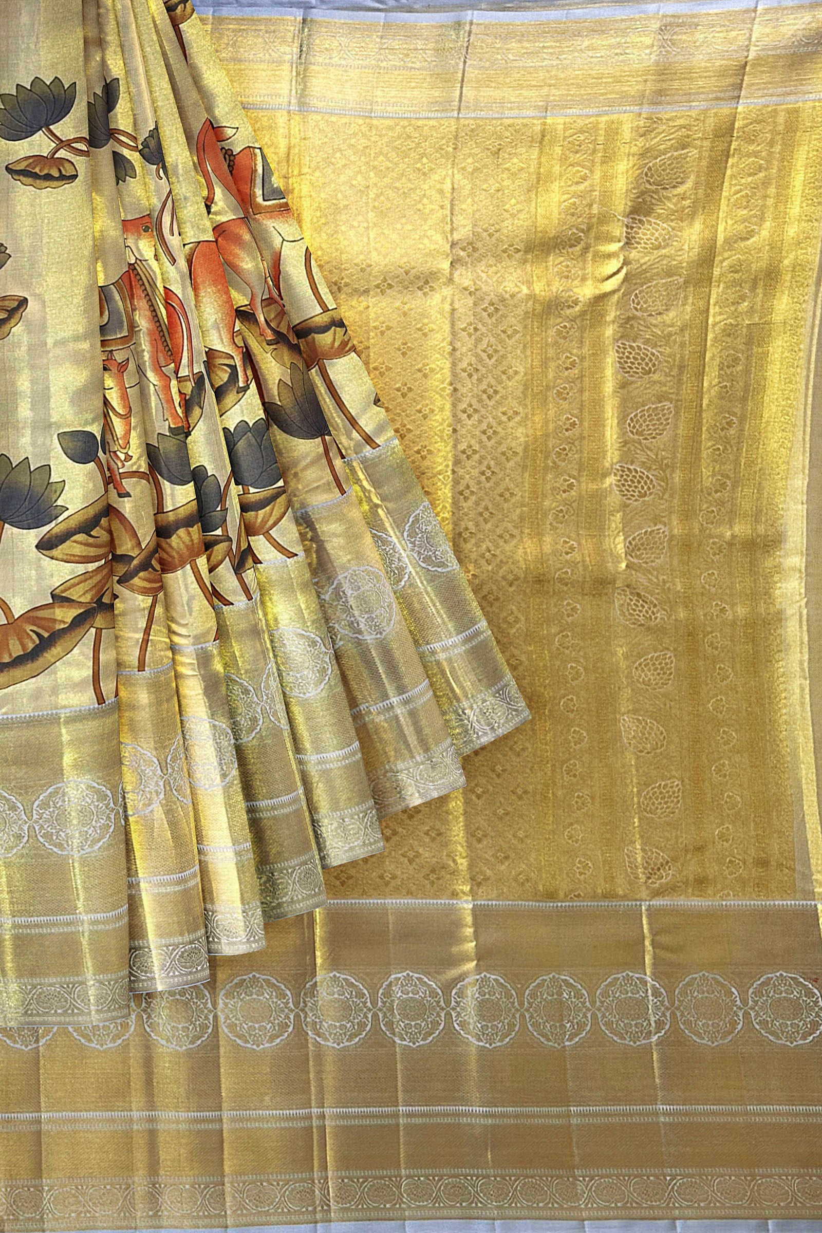 Anya - Where tradition meets fashion - Mom daughter duo in colour  co-ordinated silk kalamkari sarees! Gorgeous pen kalamkari adorning  hand-painted floral motifs in mustard Kanchi silk saree! Shop our exclusive  hand-painted